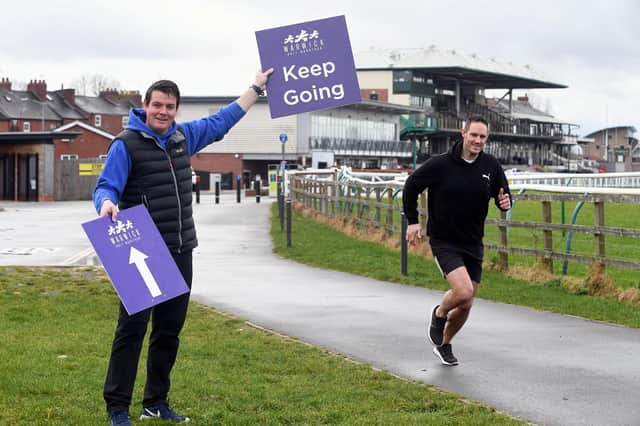 The Race Organiser director Craig Thornton and Peter Burnell, Business Relationship Manager at The Wigley Group, at Warwick Racecourse, where the race will start and end. Photo supplied