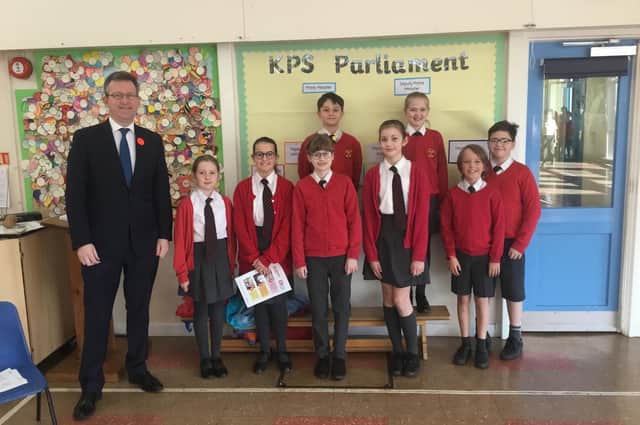 MP Jeremy Wright visited pupils at Kineton Primary School on February 4. The school has launched a new KPS Parliament with year six pupil Sam serving as the Prime Minister, Tallulah as the Deputy Prime Minister and other members of Parliament from left to right - Grace, Zara, Emma, Melissa, Oliver and William. (photo from Kineton Primary School)