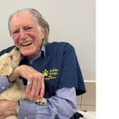 David Bradley with guide dog puppy. Photo supplied
