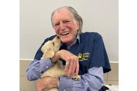 David Bradley with guide dog puppy. Photo supplied