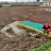 A cow trapped in a deep slurry pit in south Leicestershire was brilliantly rescued from a horrible death by firefighters from Lutterworth.