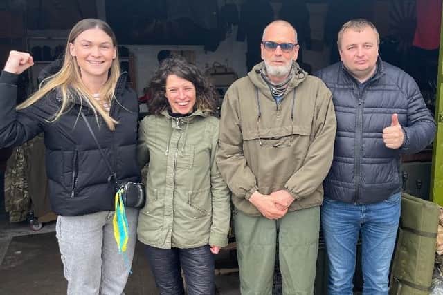 From left to right: Marina Zanfiro  is pictured with Natalia Loboda and Simon Jones of Harbury Lane Army Surplus and her friend Roman who will drive for 20 hours to deliver donated humanitarian items to help people in Ukraine.