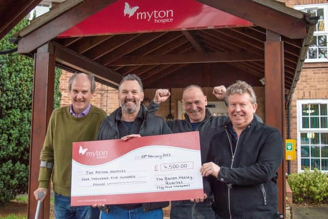 The Barron Healy Quartet; Pete Moss, Paul Hammond, Bernie Waldron, Richard Bonsall presenting a cheque for £4,500 to the Myton Hospice in Warwick. Photo supplied