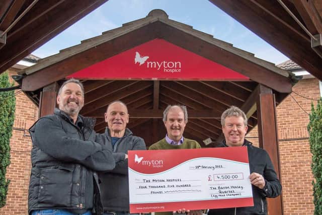 The Barron Healy Quartet; Paul Hammond, Bernie Waldron, Pete Moss, Richard Bonsall at the Myton Hospices in Warwick presenting a cheque for £4,500. Photo supplied