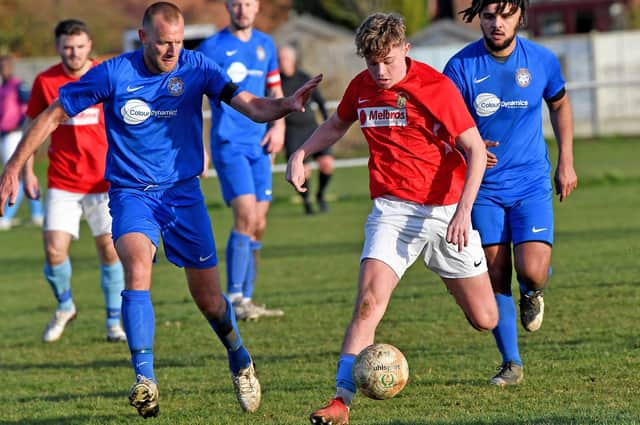 Caine Elliott scored both Rugby's goals against Desborough (Picture by Martin Pulley)