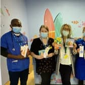 Caty Oates, from the charity ‘Kissing it Better’ kindly dropping off the books from the Leycester House care hometo the staff on the MacGregor Children’s Ward at Warwick Hospital. Photo supplied