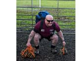 Paddy Doyle doing the squats with 81lb of weight