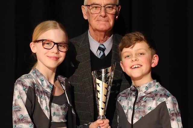 At the Leamington Stage Dance Festival, which took place towards the end of last month, young dancers Rosanna Nealon and Alfie Jones of the Christine Anderson Theatre School, Rugby were presented with The Carole Langford Trophy for their love of dance by Carole's husband Tony. Photo by David Felton Photography