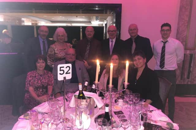 Matt Western with Adrian Bush and Turpin family members Lewis, Keith, Annette, Charmaine, John Sr, Sam, Bernie and John Jr.