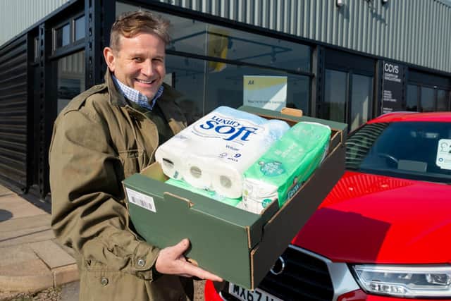 Martin Holton, who runs Country Car in Barford, is also holding a donation station at the car dealership