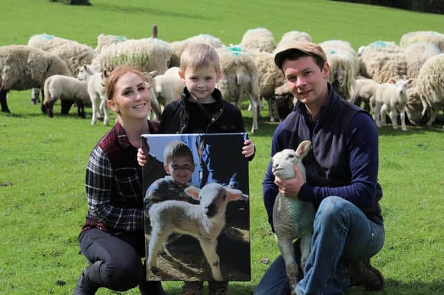 Melissa Dee Talbot-Hyde and her son Mason with farm manager Henry Dingle in 2019 after winning the photography competition. They are set to return to the event this year. Photo supplied