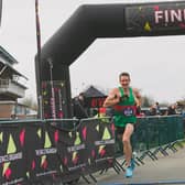 Winner of the men's Wigley Group Warwick Half Harathon Ian Allen crossing the finish line. Photo supplied