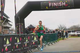 Winner of the men's Wigley Group Warwick Half Harathon Ian Allen crossing the finish line. Photo supplied