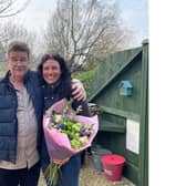 Steve Taylor presented Pip Blair with a bouquet during an emotional reunion at
Winchcombe Farm, a holiday retreat he runs with his wife Jo Carroll, in Upper Tysoe. Photo supplied