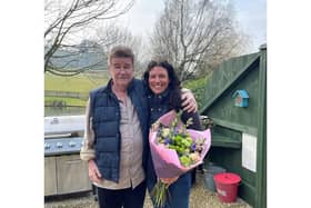 Steve Taylor presented Pip Blair with a bouquet during an emotional reunion at
Winchcombe Farm, a holiday retreat he runs with his wife Jo Carroll, in Upper Tysoe. Photo supplied