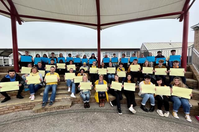 Myton School held a non-uniform fundraising event where they wore blue and yellow. The photo shows sixth form students taking part. Photo supplied