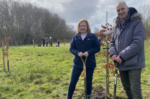The county council's country park rangers were joined by residents and Cllr Andy Jenns and Cllr Heather Timms (both pictured above), who donned their wellies and wielded spades to plant 14 native woodland trees, marking the end of the third season of the planting scheme.