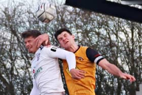 Jack Edwards winning an aerial battle with Hereford   PICTURES BY SALLY ELLIS