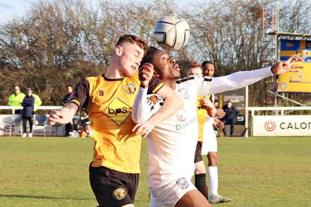 Dan Turner head to head with a Hereford opponent