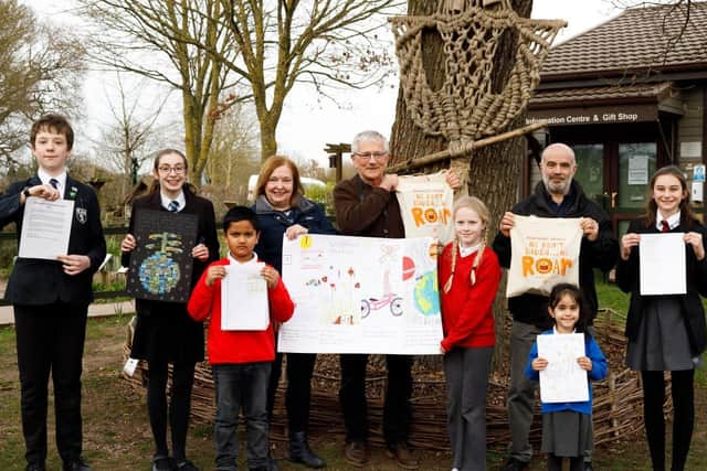 12-15 winner Oliver Peake; 12-15 runner up Emilia Hone; 4 – 7 runner up Tahmeed Anaam; Cllr Heather Timms; David Mond; 8-11 winner Shirley Jo Slade; Ed Green; 4 – 7 winner Elina Williams;12-15 runner up Martha Pearson.