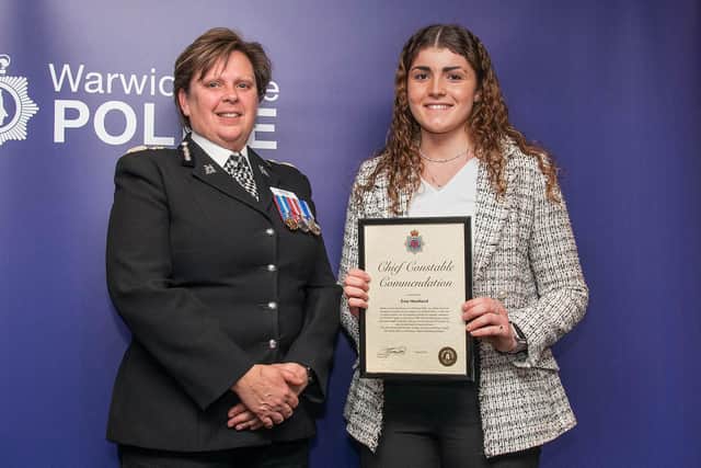 Evie Headland, 17, from Rugby receives her award from Warwickshire Chief Constable Debbie Tedds.
