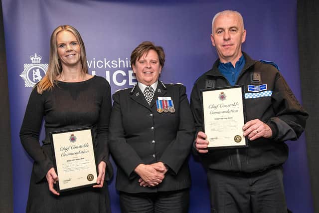 PCSO Helena Seal and PCSO Tony Winter receive their awards from Warwickshire Chief Constable Debbie Tedds.