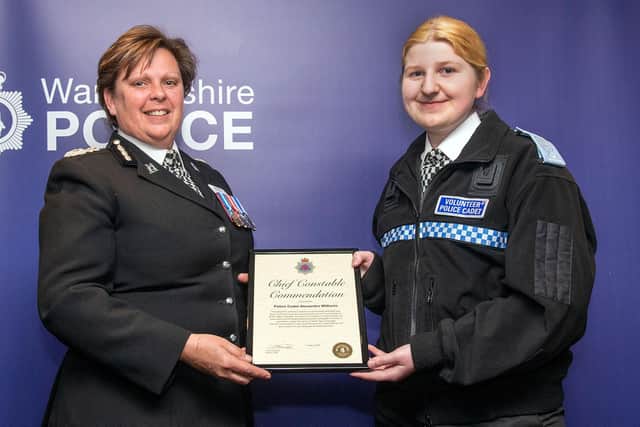 Warwickshire Police Cadet Alexandra Williams receives her award from chief constable Debbie Tedds.