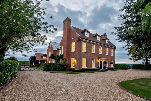 The property is set in nine acres of ground, which also includes stables
