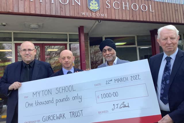 Andy Perry, Head Teacher; Mark Simmonds, Chair of Friends of Myton School
(FOMS); Dr Gurmit Singh, Gursewak Trust trustee; and Iain Goddard from Leamington chartered accountants, Harrison Beale and Owen, who has partnered with Gursewak Trust’s board. Photo supplied