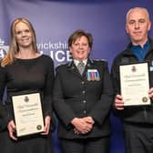 PSCOs Helena Seal and Tony Winter, with their awards presented by Chief Constable Debbie Tedds.