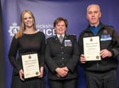PSCOs Helena Seal and Tony Winter, with their awards presented by Chief Constable Debbie Tedds.