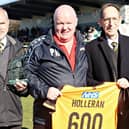 Leamington Manager Paul Holleran (centre) marking 600 games in charge with Director Kevin Watson and Club Ambassador Brian Knibb