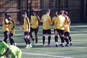 Racing Club Warwick celebrate Romario Martin's leveller against Boldmere St Michaels