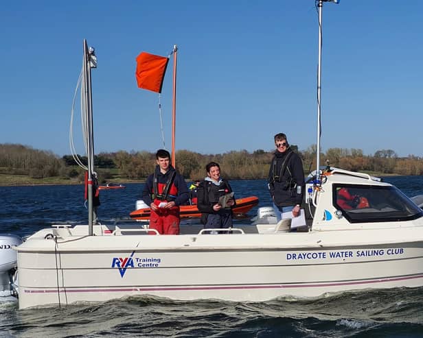 Draycote sailors, all aged 17, running the racing - Ted Ball, Millie Irish and Ethan Cheshire. Picture by Jonathan Hughes