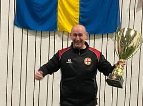 Captain Chris with the trophy