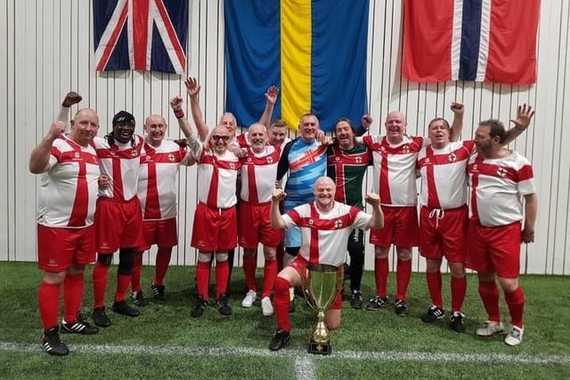 Chris Clements celebrating with the victorious England Over 50s walking football team in Sweden