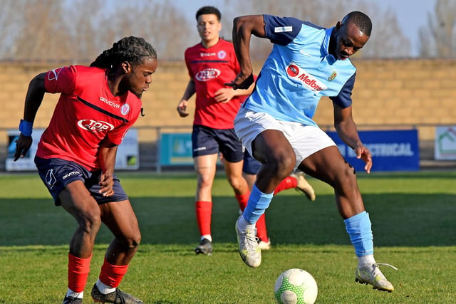 Madundo Semahimbo spins past his marker