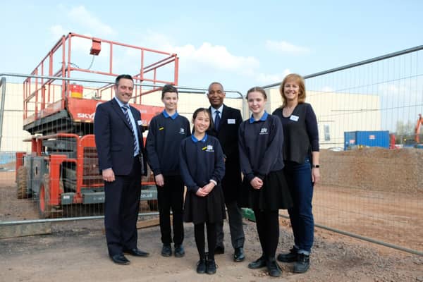 Kenilworth School pupils with head Hayden Abbott (centre), chair and vice chair of governors Shirley Whiting (right) and Richard Hales (left)