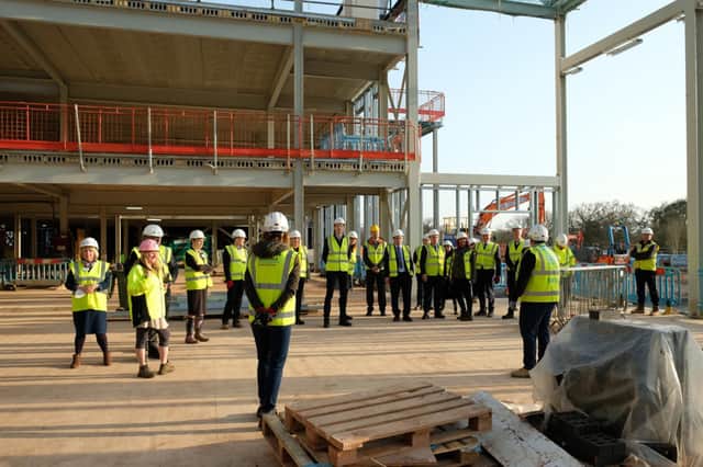 A topping out ceremony recently took place at the new site with staff, pupils and members from trusts and organisations