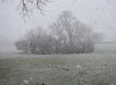 The snow was as its heaviest at around 9.30am - as seen in this dramatic photo.