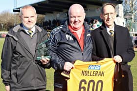 Manager Paul Holleran marking his 600th game with Director Kevin Watson and Club Ambassador Brian Knibb (by Sally Ellis)