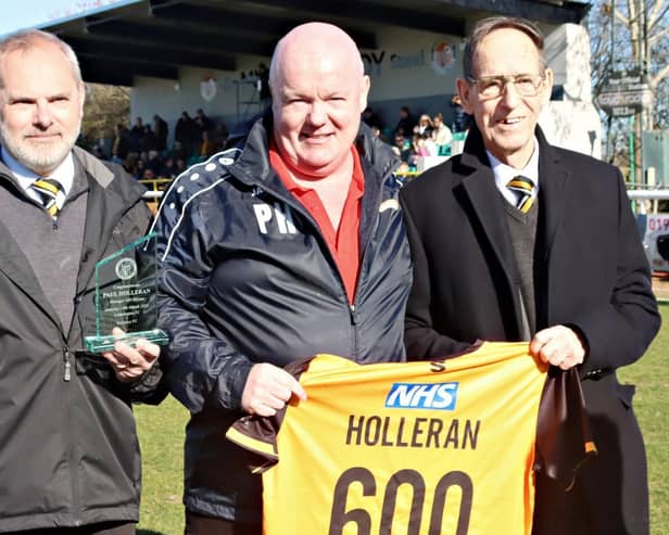 Manager Paul Holleran marking his 600th game with Director Kevin Watson and Club Ambassador Brian Knibb (by Sally Ellis)