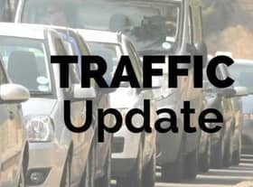 The A14 is closed in both directions after a lorry crashed onto the opposite carriageway.