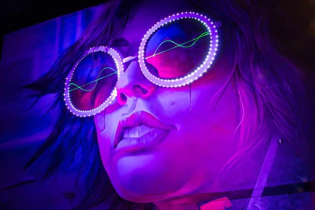 Leamington-based laser display company Reach Lasers has sent us in these images of its cool and spectacular installation which it set up for the new Future Synth mural in Clemens Street.