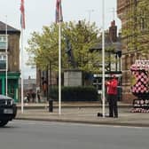 A Rugby ranger flies the Union flag at half mast.