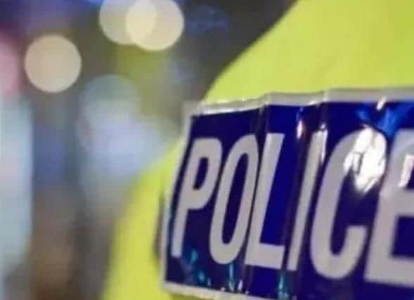 A Rugby man allegedly racially abused a police officer after he was arrested for reportedly swearing at 999 call handlers.
