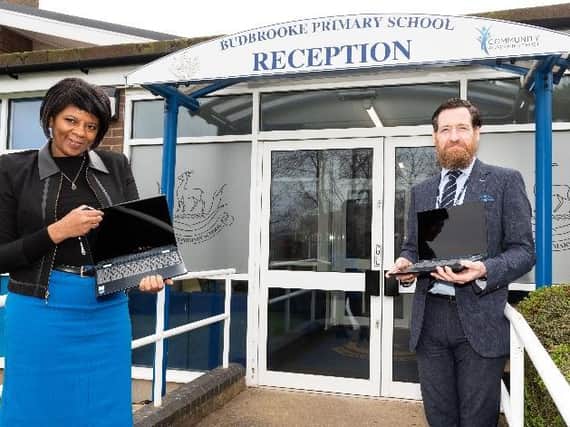 Angela Nurse, sales manager for Bellway South Midlands, and Craig McKee, Head Teacher at Budbrooke Primary School in Hampton Magna. Photo supplied