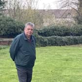 Cllr Neil Sandison in Holy Trinity Churchyard off Church Street, a location that Rugby's Lib Dems say could be utilised with a sculpture, monument or benches. Photo: Rugby Lib Dems.