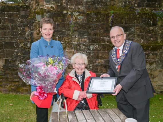 Audrey Price and her daughter Alison Selwood receive an Award of Merit from Kenilworth Mayor Cllr Richard Dickson which was given posthumously to Audrey's husband and Alison's father Derek Price.