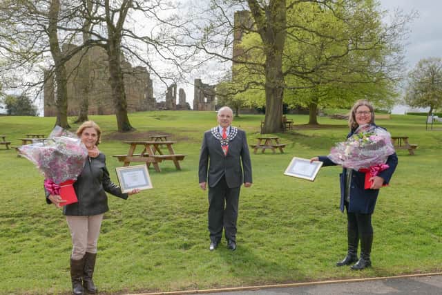 Helen Braithwaite and Pauline Hayward  receive an Award of Merit from Kenilworth Mayor Cllr Richard Dickson.